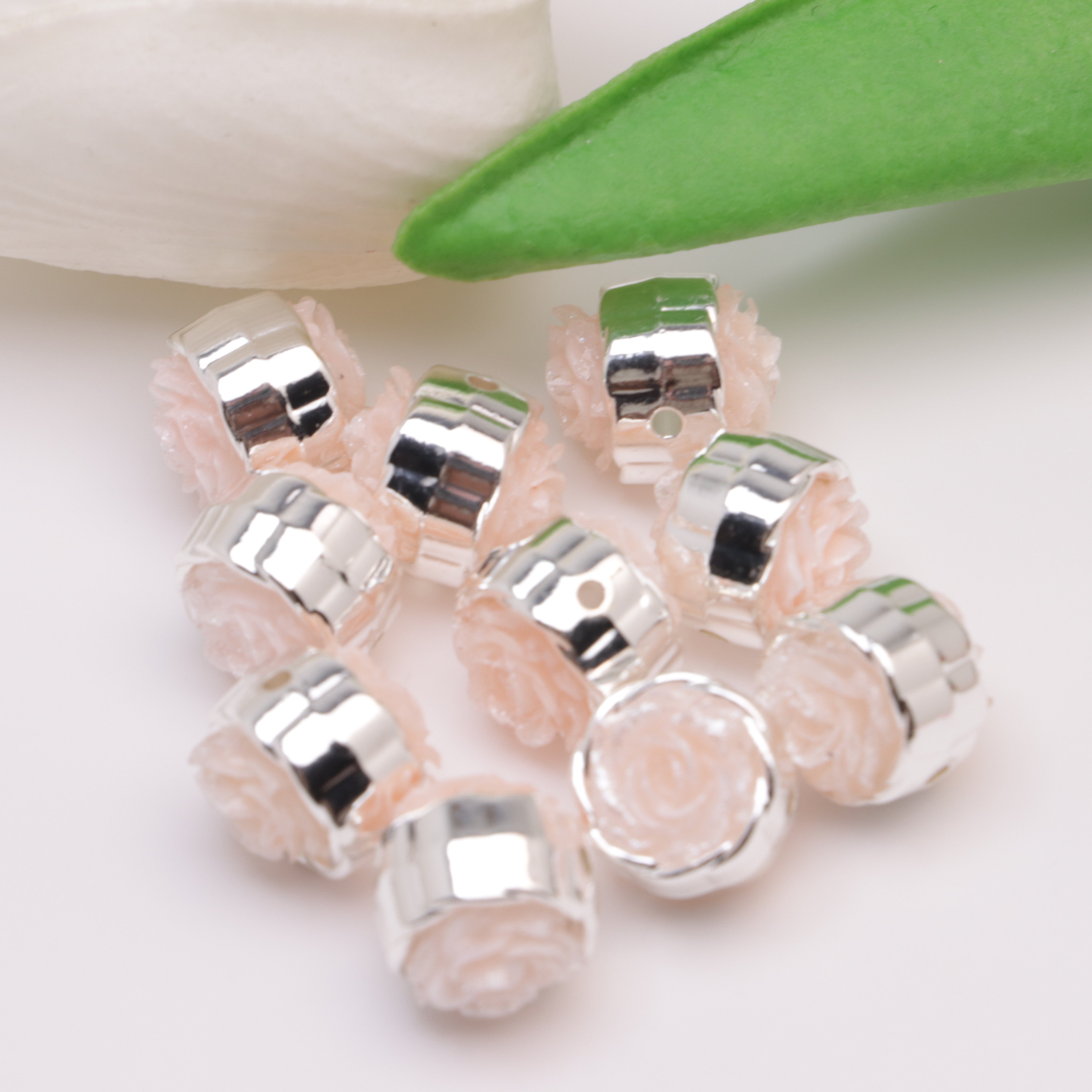 FS4384- 12mm Glow-in-the-Dark + Softened Light Soft Flower Metal Beads