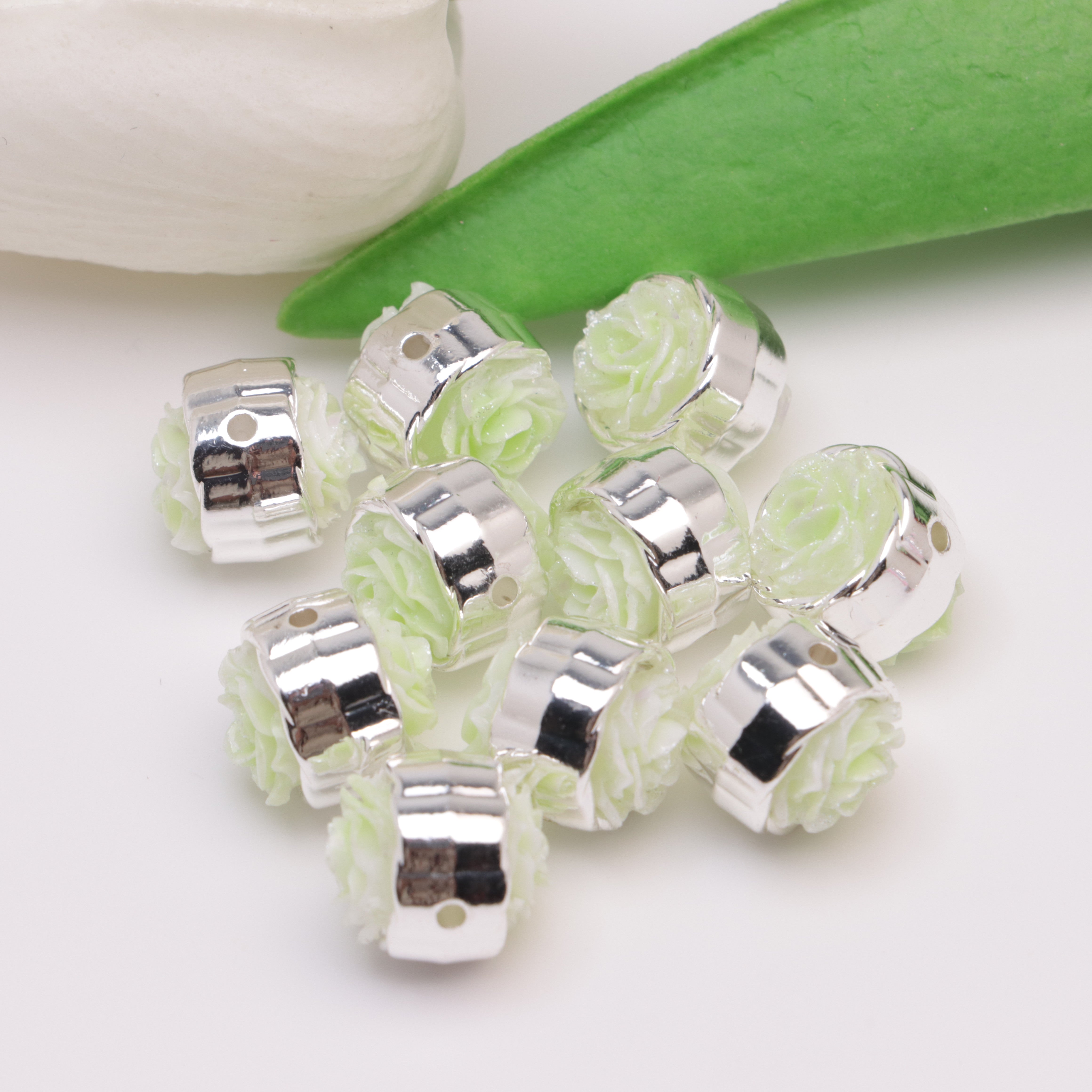 FS4384- 12mm Glow-in-the-Dark + Softened Light Soft Flower Metal Beads