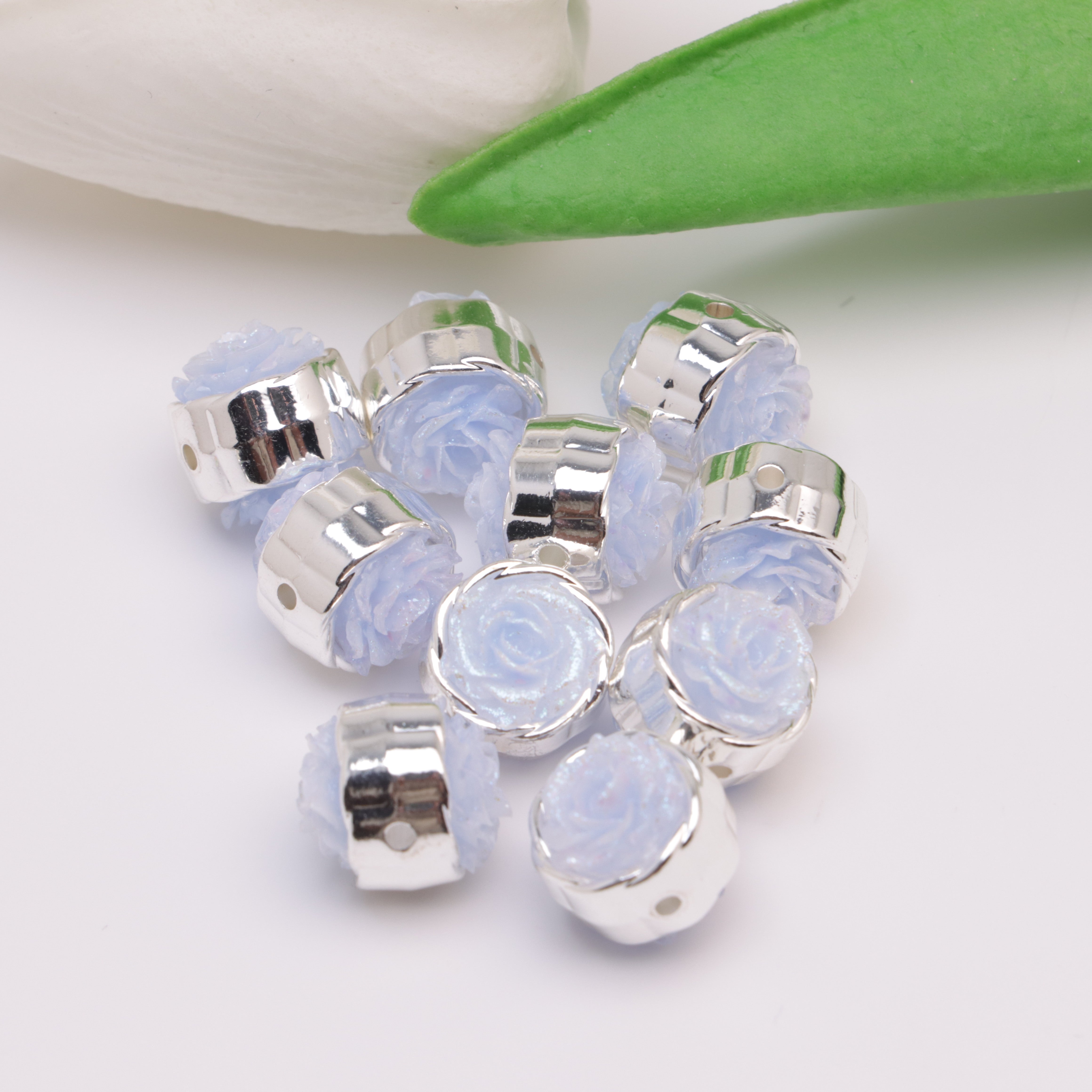 FS4384- 12mm Glow-in-the-Dark + Softened Light Soft Flower Metal Beads