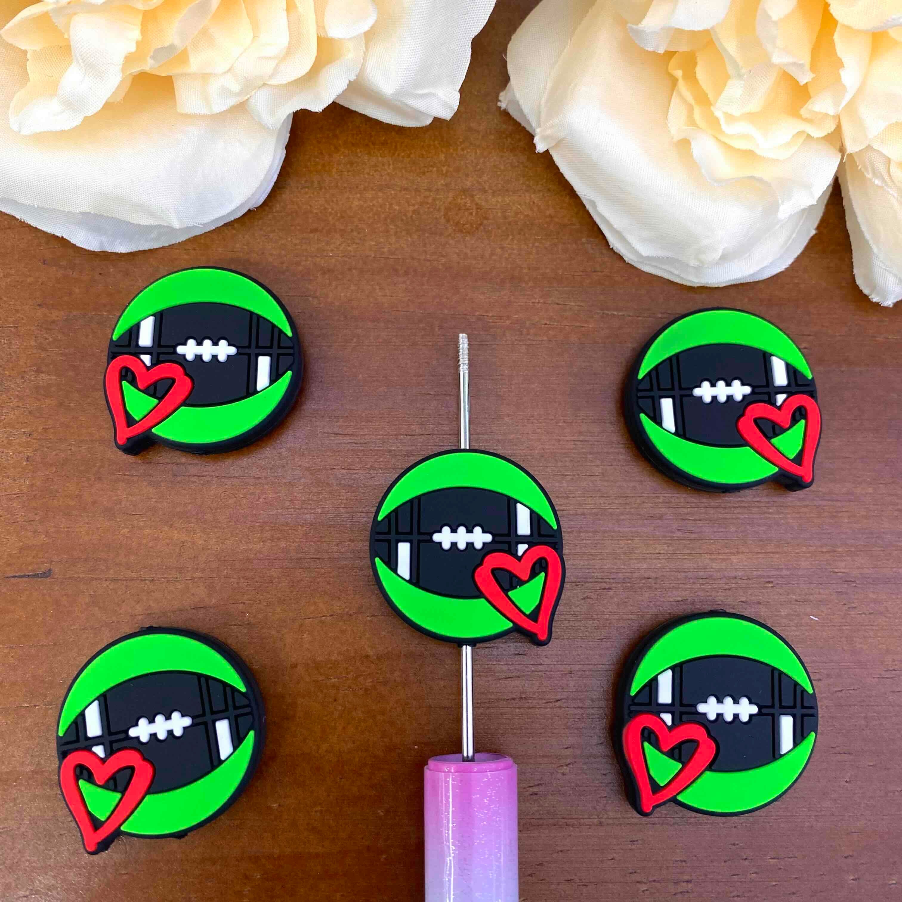 FS20616-Football Heart Flat Silicone Focal Beads
