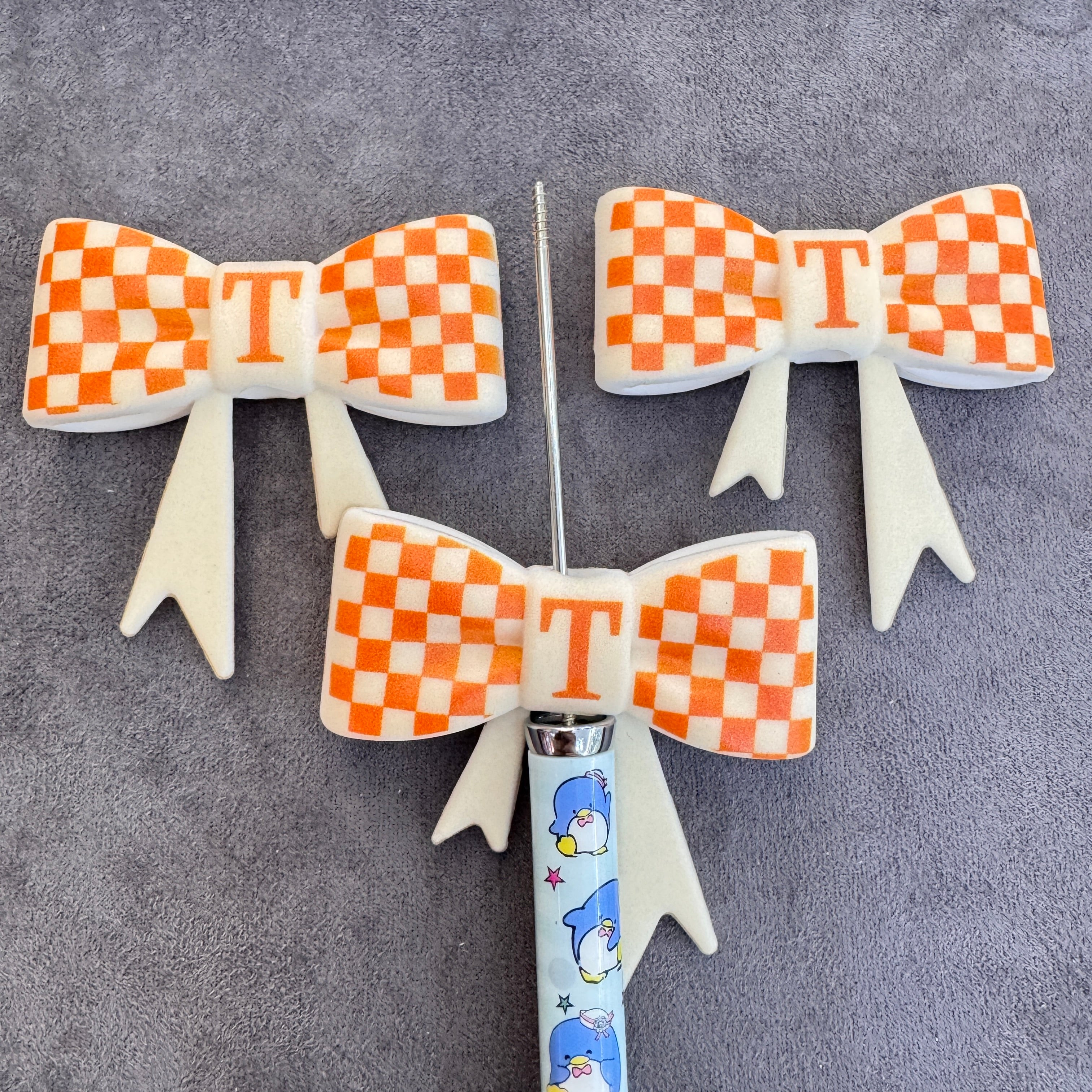 Silicone Focal Beads Soft Bowtie with Orange‑White Checkerboard Prints