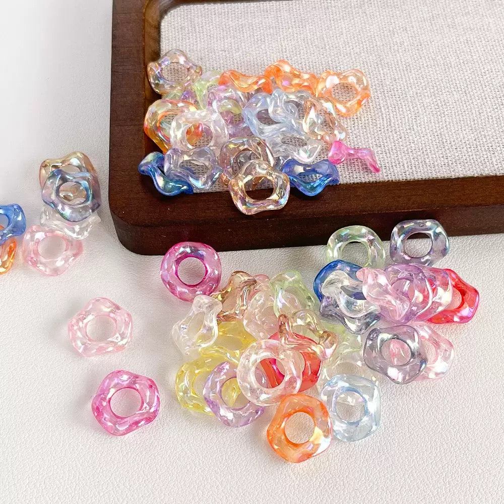 FS19422-About 16mm Clear UV Coating Wave Spacer Beads