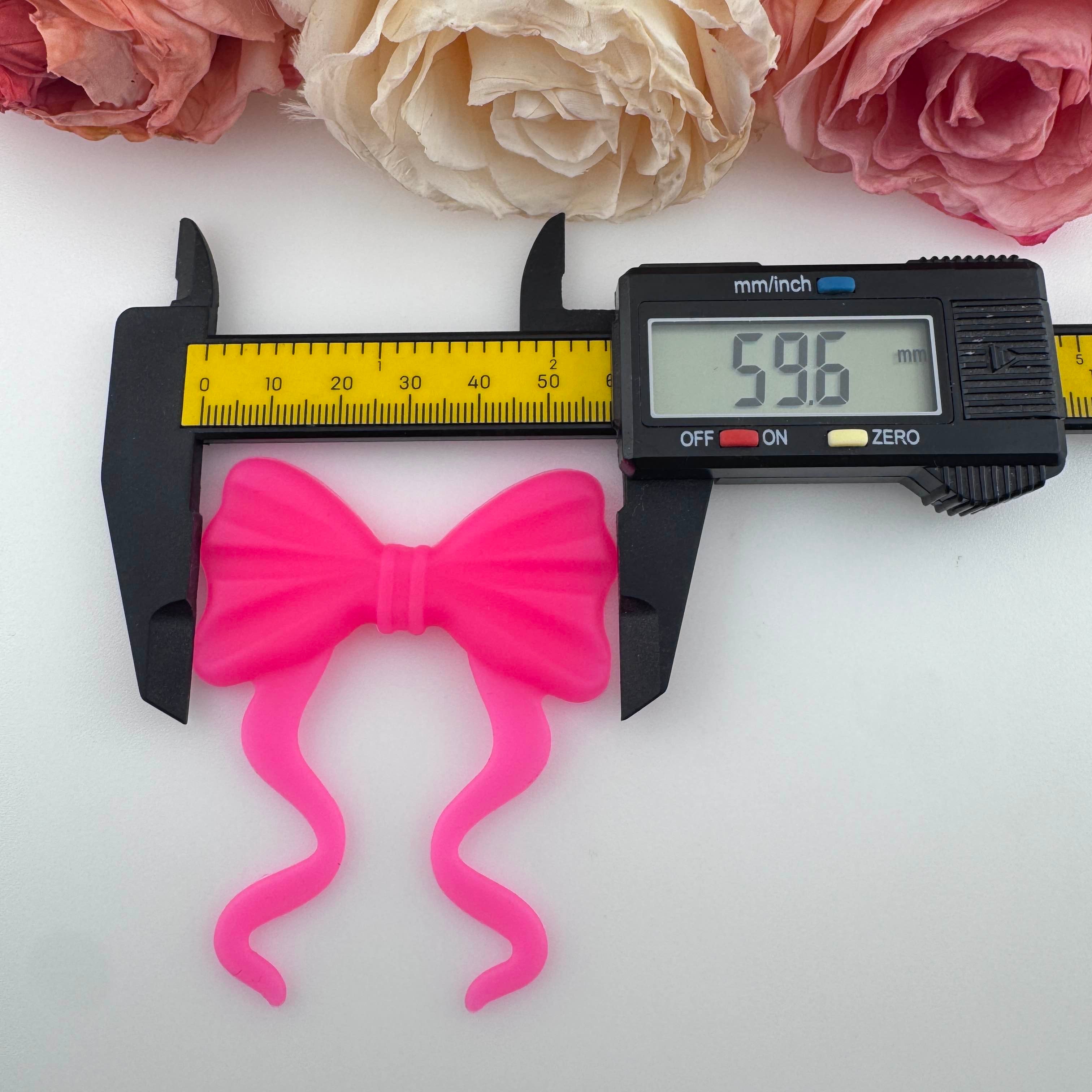 FS19388-About 60×70mm Silicone Bow Beads
