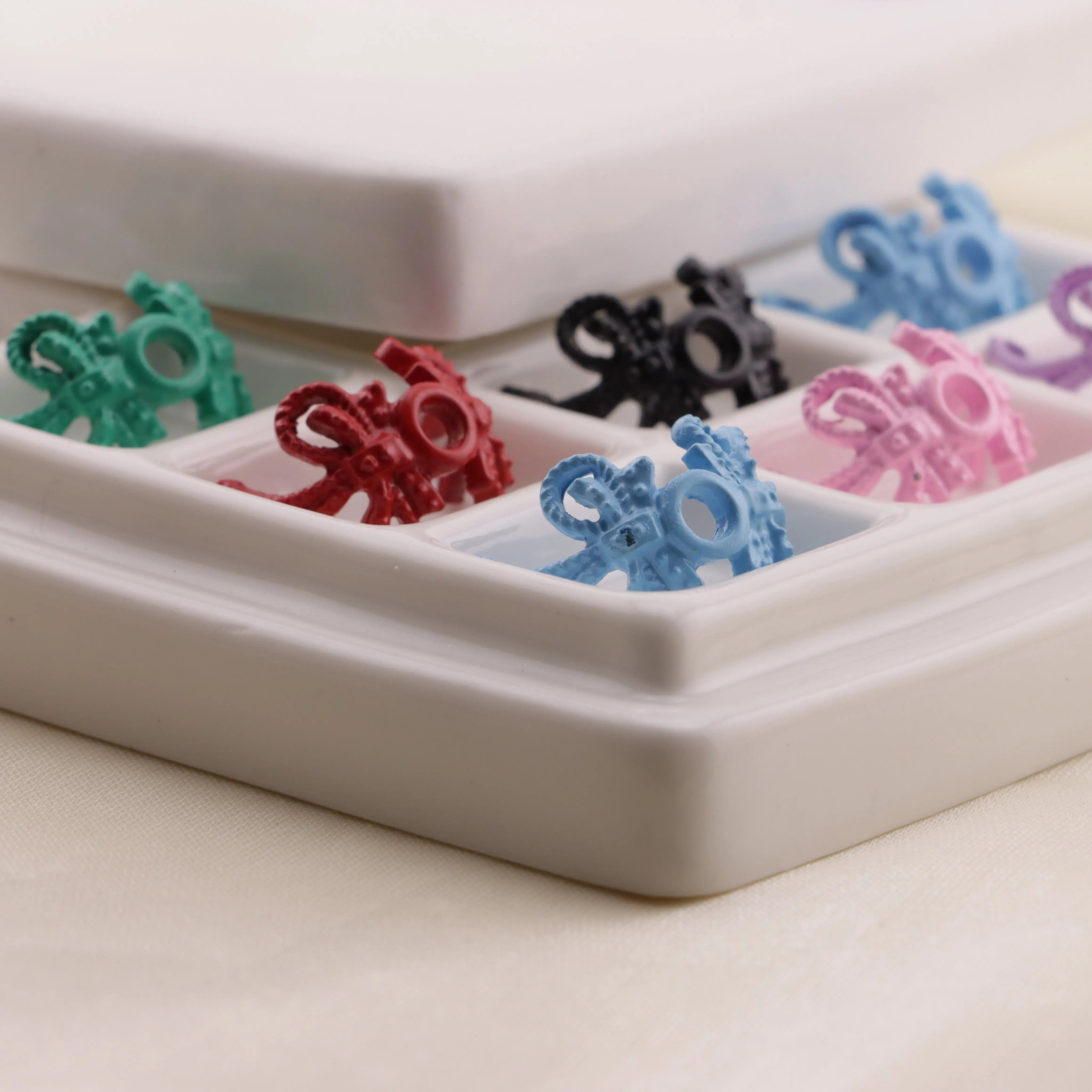 ENAMEL DOUBLE BOWS METAL SPACERS Enamel Double Bows Metal Spacers ZoeDIY Shop