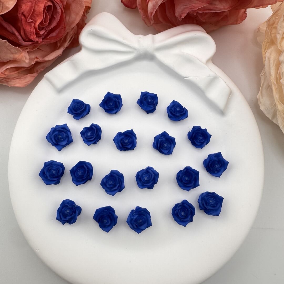 FS10921-About 8mm Royal Blue Hard Luminous Flower Nail Charms