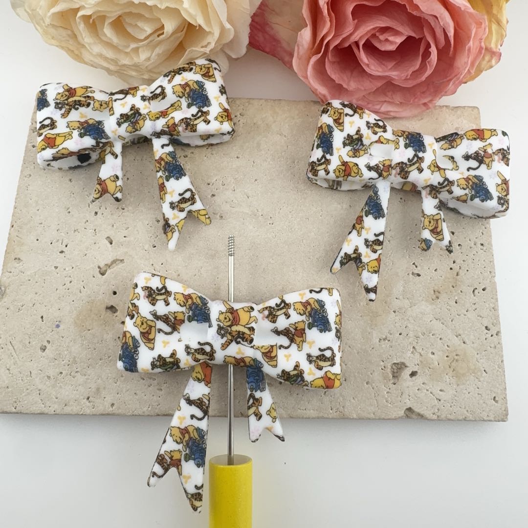 FS19611-About 50*60mm Winnie Silicone Focal Bow Beads