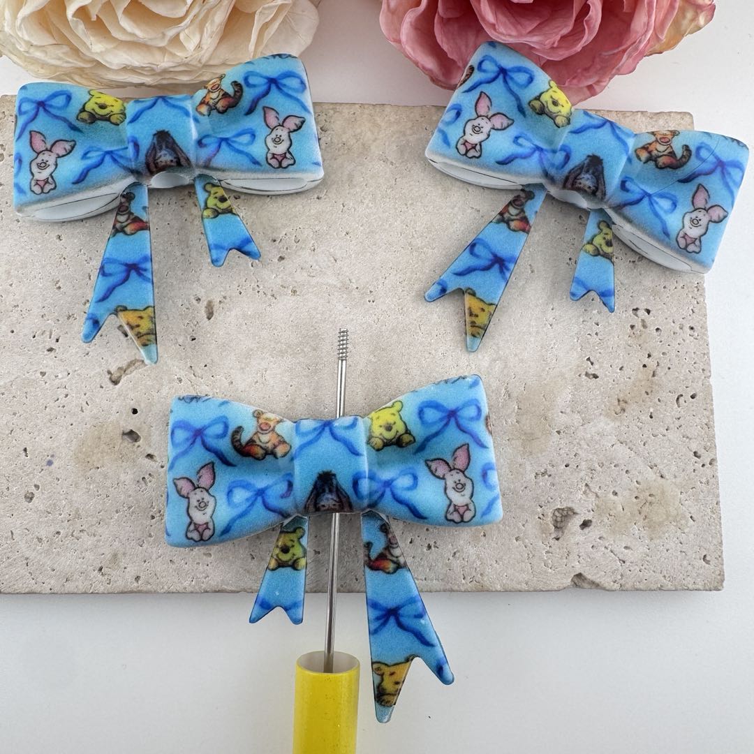 FS19618-About 50*60mm Winnie Silicone Focal Bow Beads