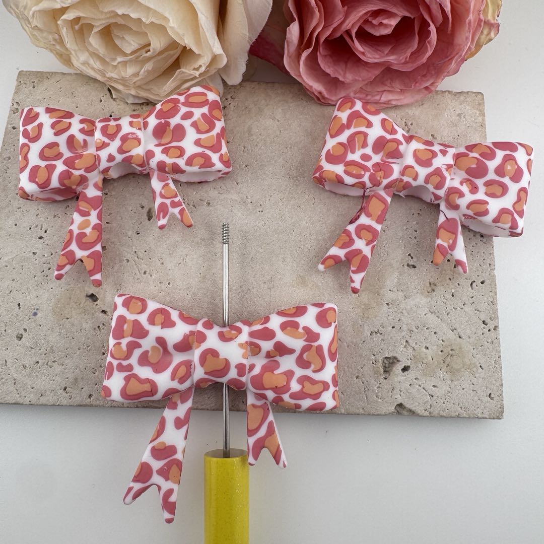 FS19625-About 50*60mm Leopard Print Silicone Focal Bow Beads